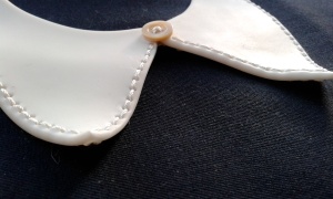 Stitched porcelain collar
